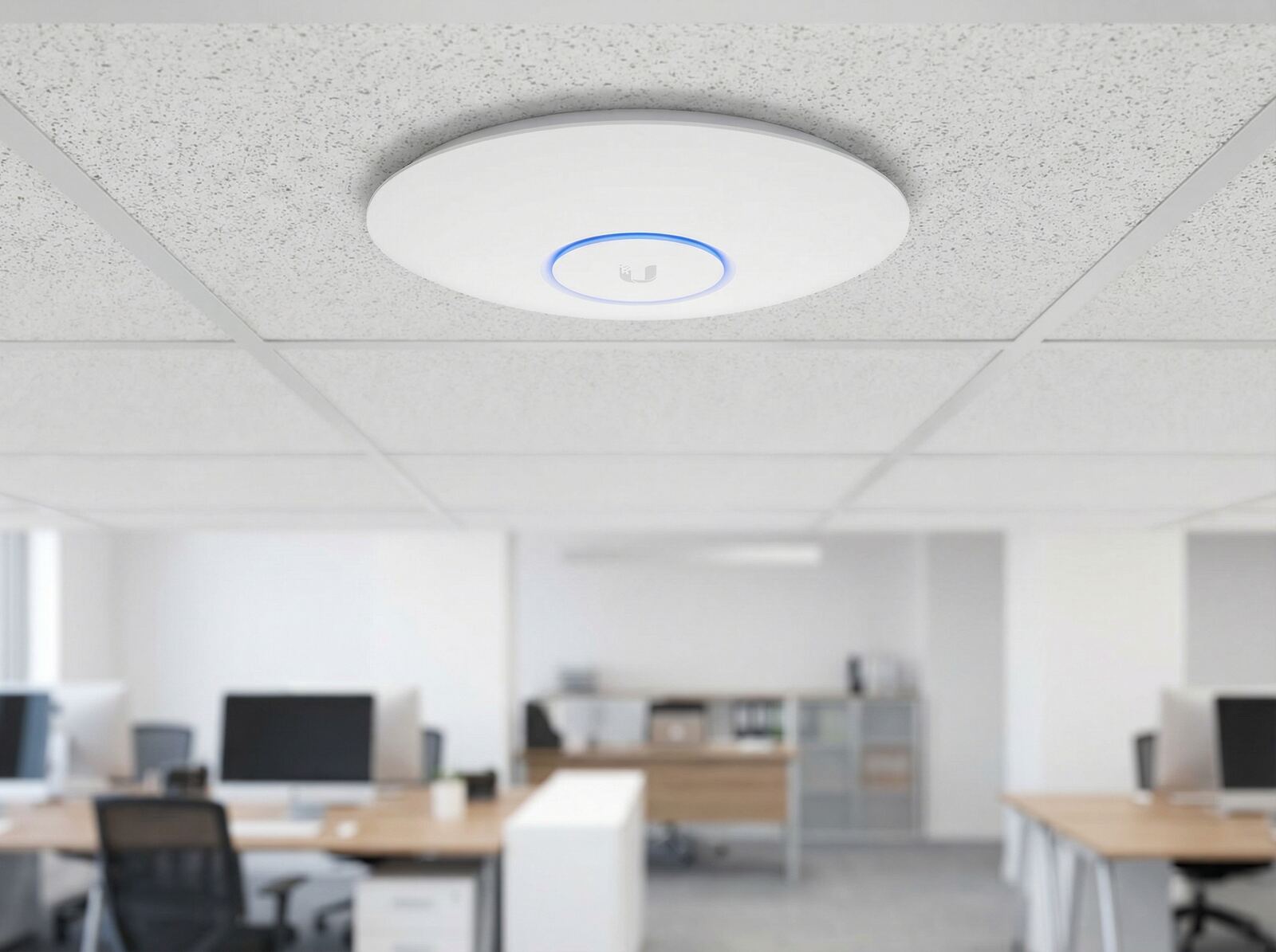 PoE-powered ceiling access point.