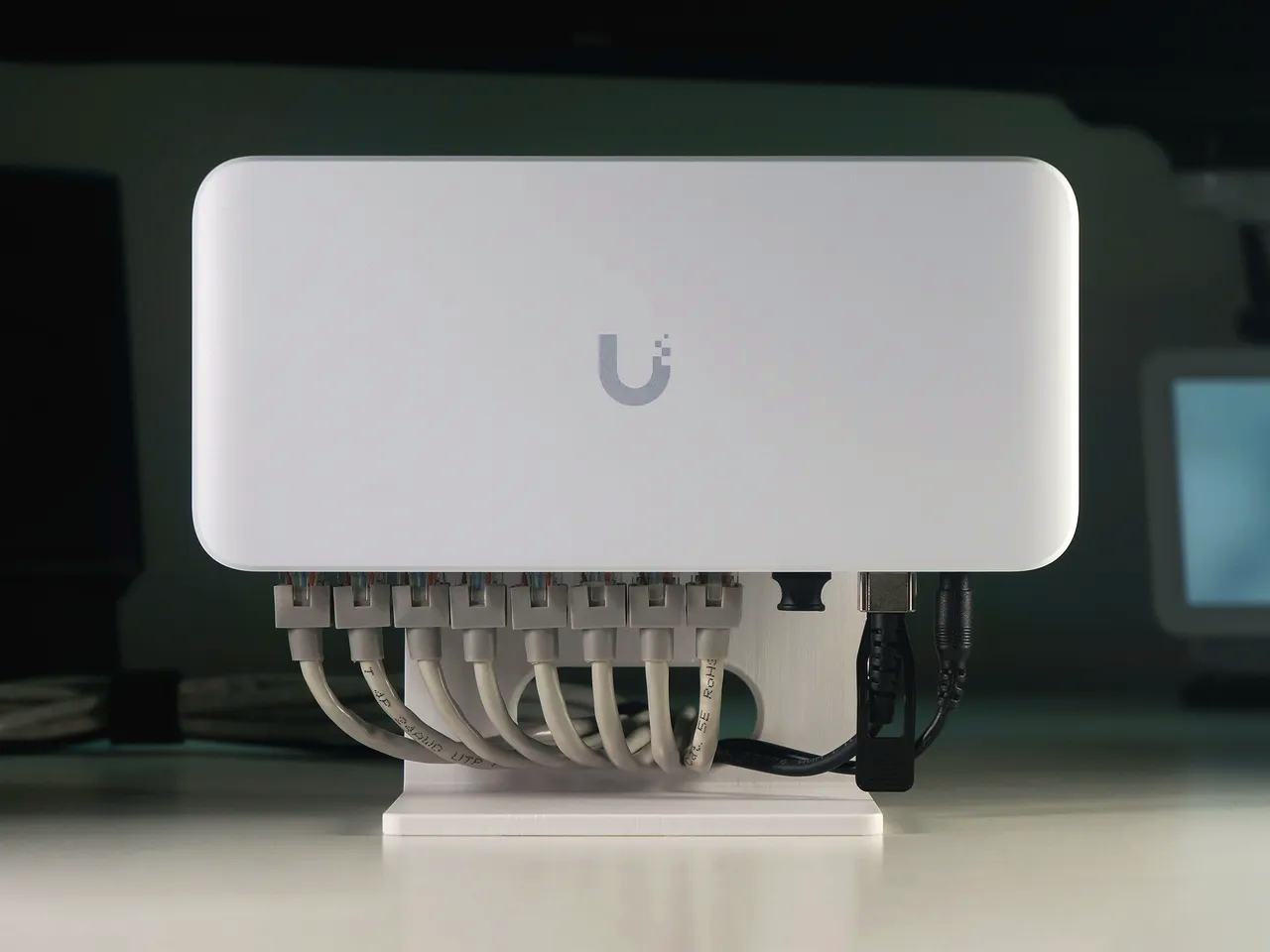 PoE-powered ceiling access point.